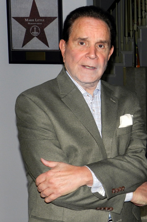 Hire Rich Little for an event.