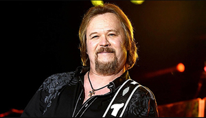 Hire Travis Tritt for an event.